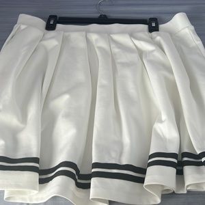 White skirt with 2 black stripes o kinda looks like those kawai anime skirts
